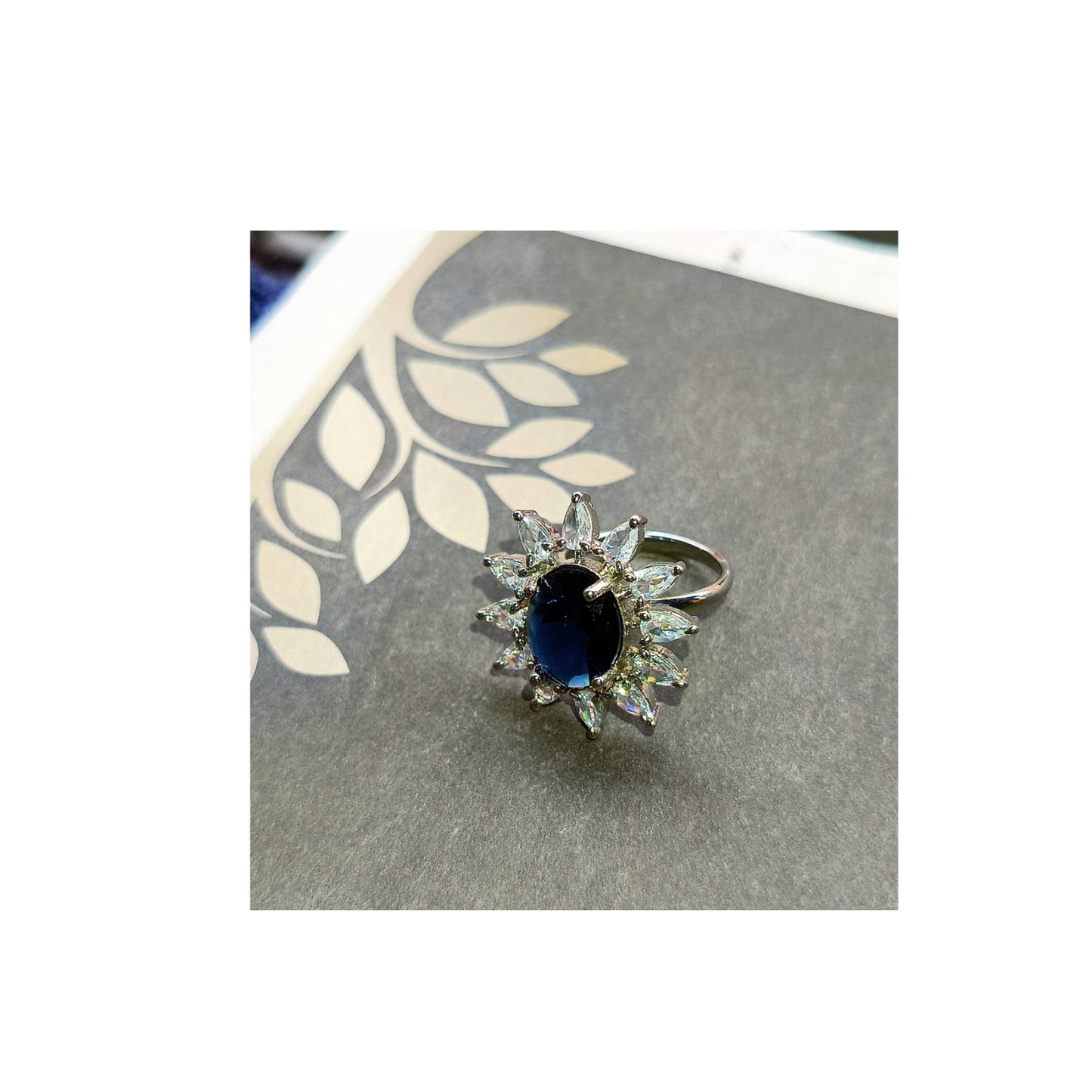 Adjustable American Diamond Ring With Blue Oval Colored Stone