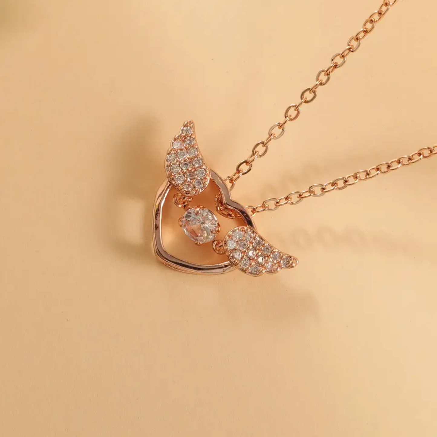 Dancing Diamond Angel Wings Shape Pendant With Chain - Rose Gold