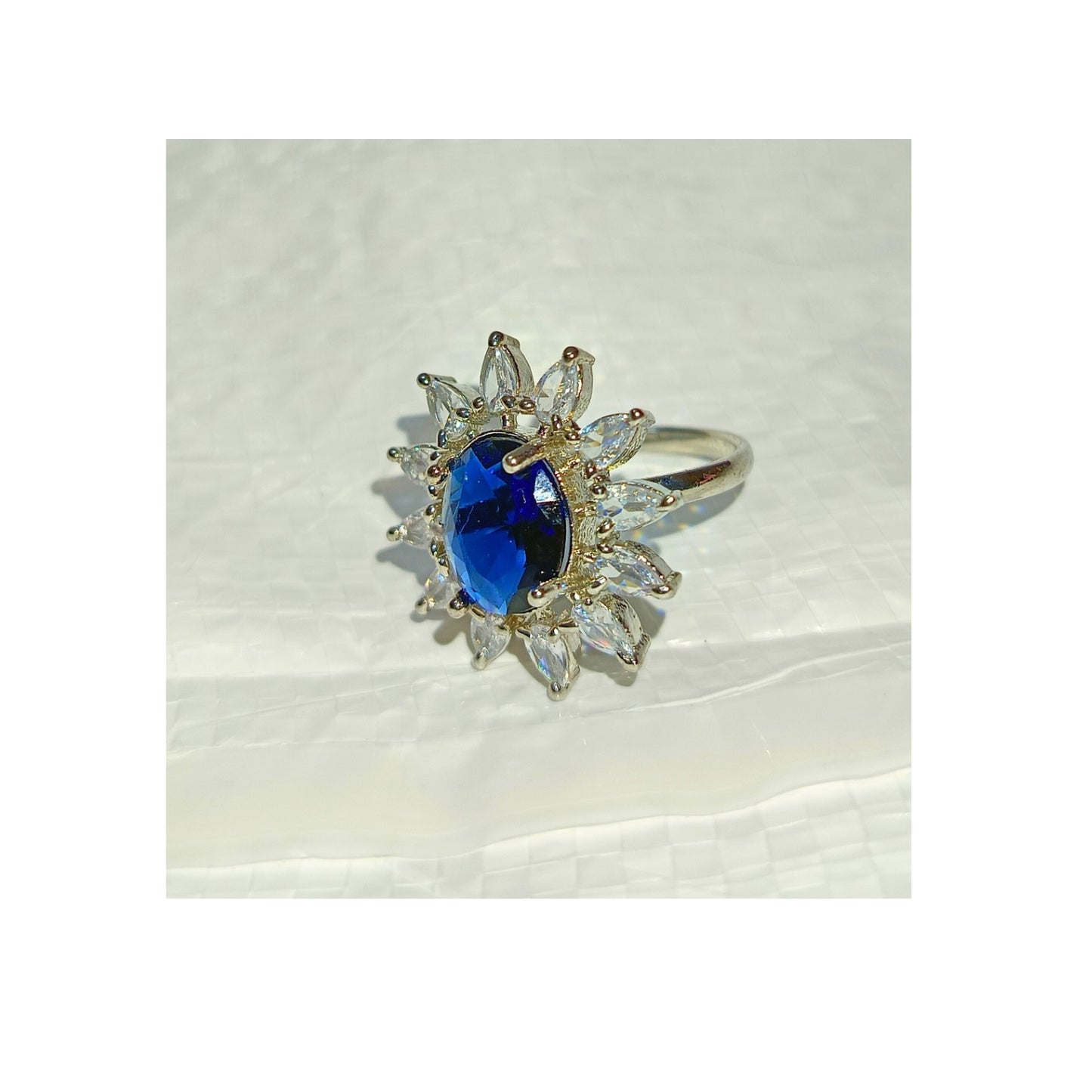 Adjustable American Diamond Ring With Blue Oval Colored Stone