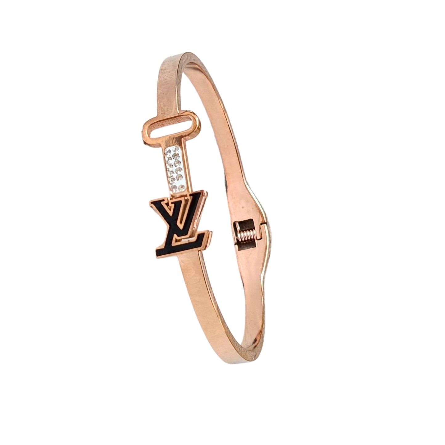 Close-up of a rose gold bracelet featuring a sleek key and initial design, with sparkling accents, perfect for stylish women.