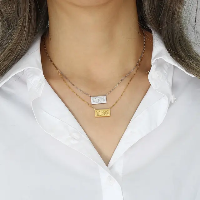 11:11 silver necklace with rectangular pendant and chain, ideal for manifestation and minimalist style.