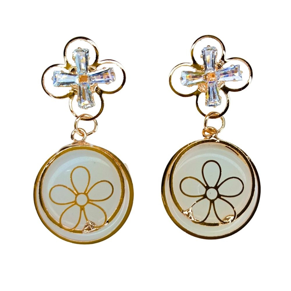 Gold-plated crystal flower drop earrings featuring a clover-shaped crystal design and delicate floral charm, perfect for weddings and parties.