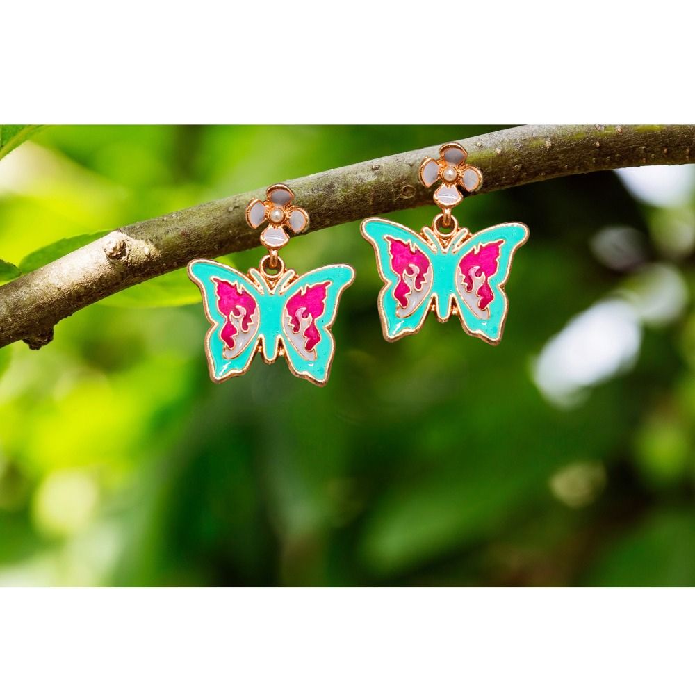 Colorful butterfly dangle earrings with turquoise and magenta enamel accents, paired with delicate gold-tone floral studs.
