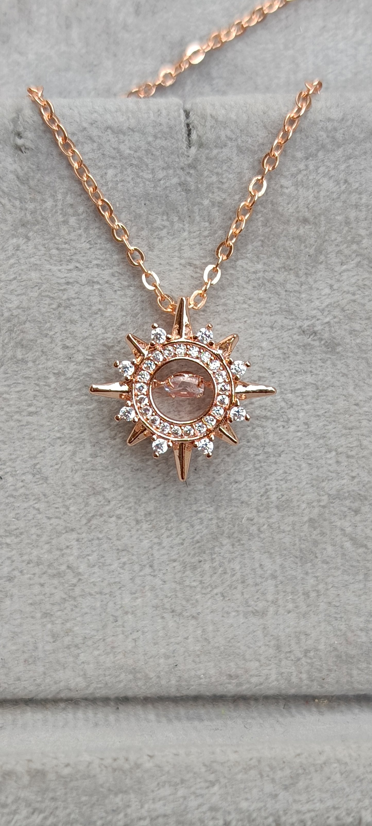 Dancing Diamond Sun Shape Pendant With Chain - Rose Gold